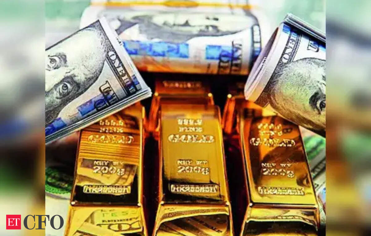 Gold slips as dollar ticks higher, US inflation report in focus