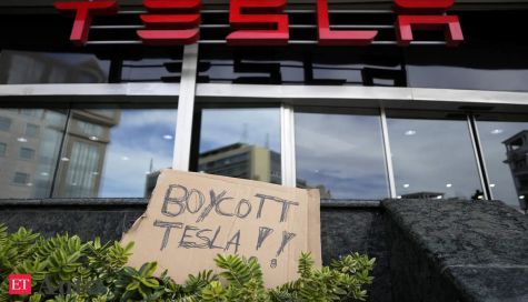 Trump says he's going to buy Tesla as more Americans say they won't